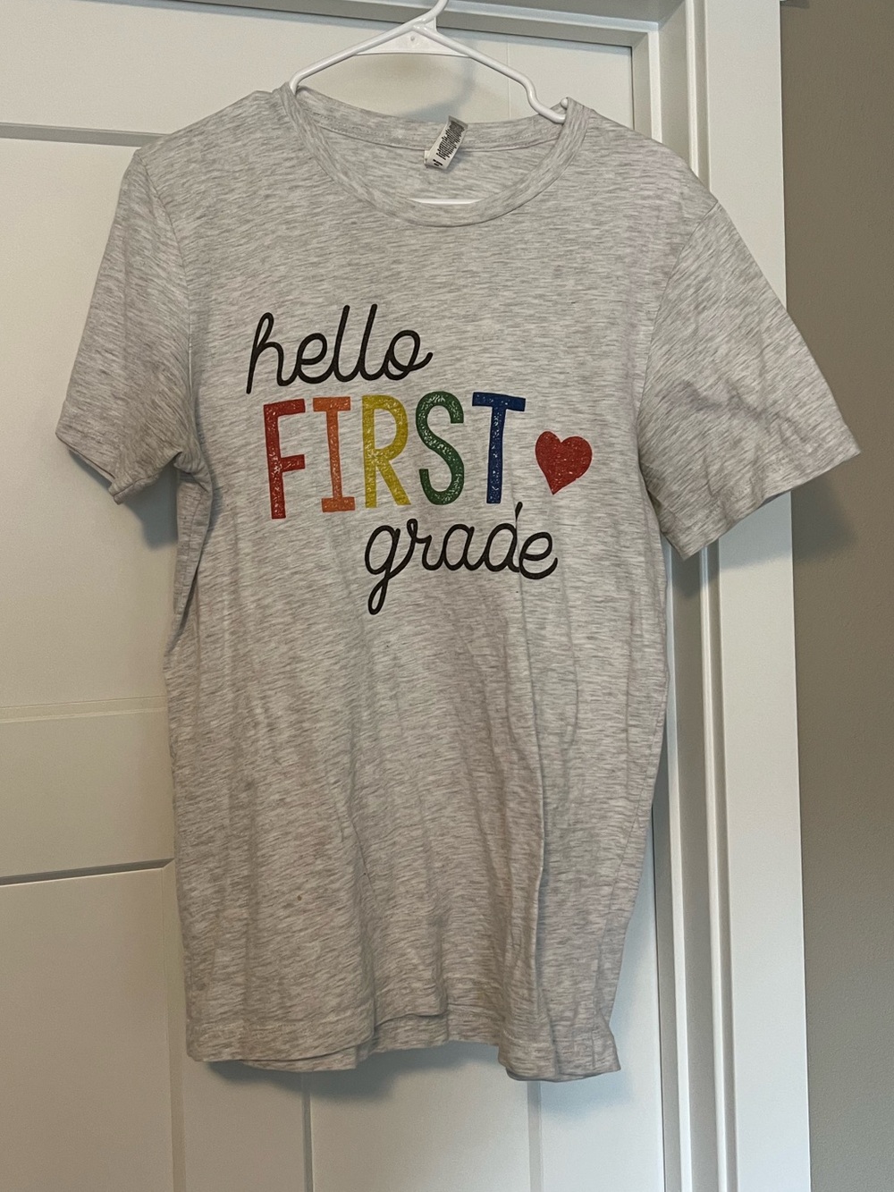 Bella Canvas Light Gray Hello FIRST Grade Graphic Tee with Multicolor Letters